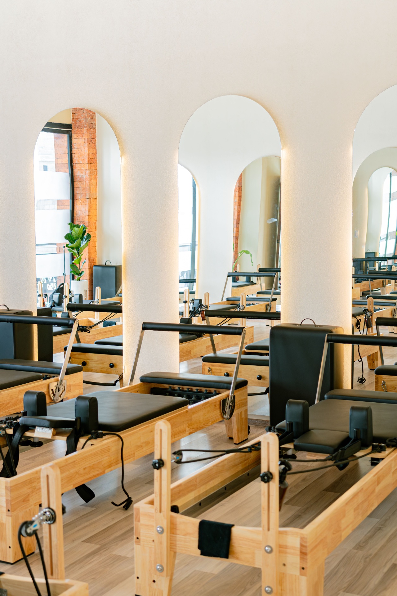 Boutique pilates studio interior with reformers